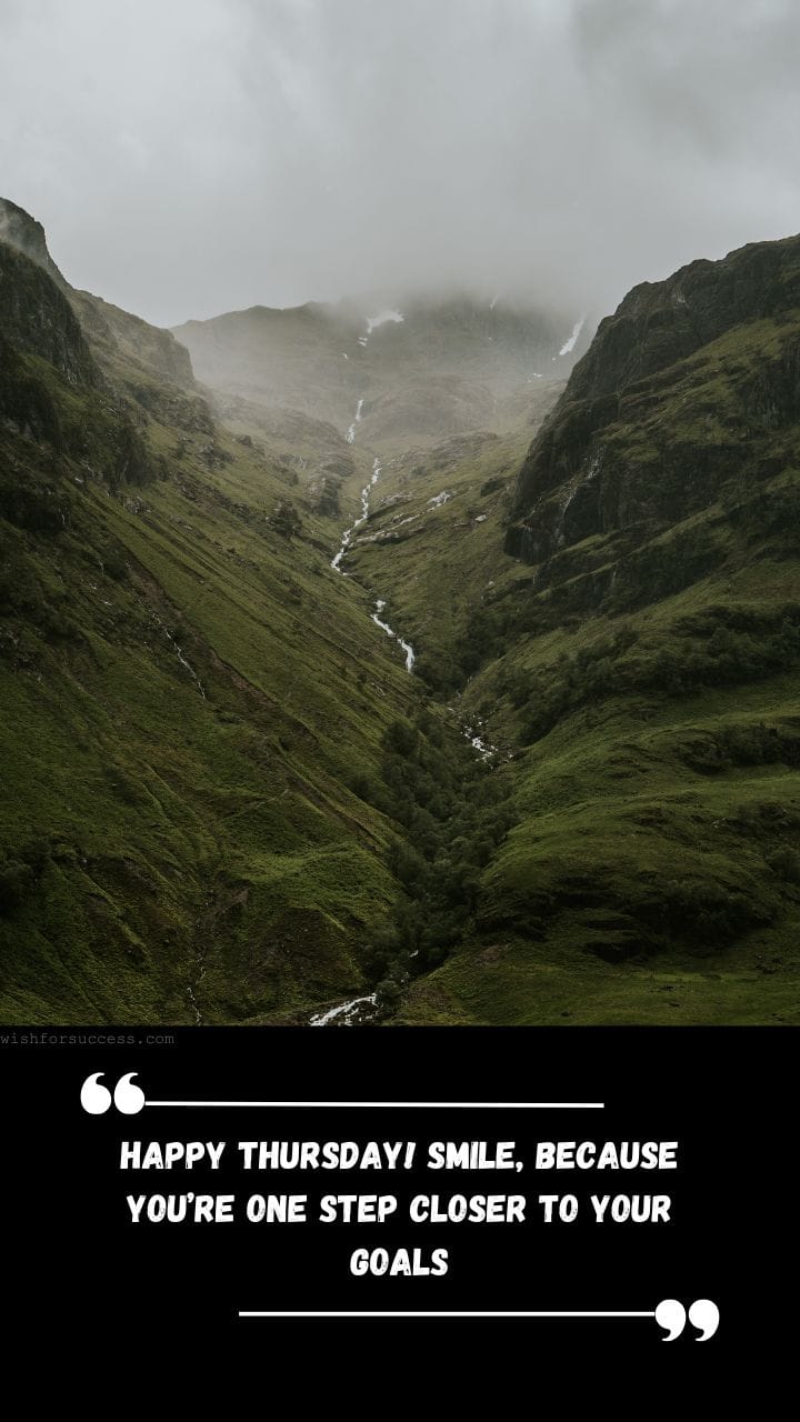 Best Positive Thinking Thursday Motivational Quotes Images Free Download | Motivational Wallpaper A misty green valley with a stream flowing through it under a cloudy sky. Overlay text reads: "Happy Thursday! Smile, because you're one step closer to your goals."